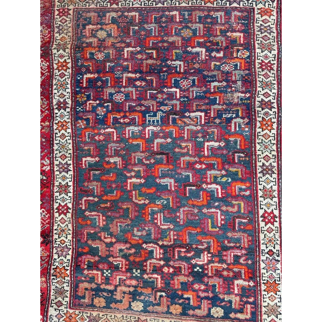 Nice antique malayer rug with beautiful tribal design and nice natural colours, with some loses and some fading colours,...