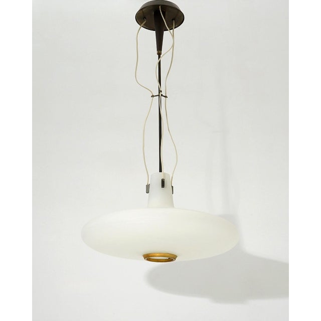 Produced by Bruno Chiarini in the 1950s, this chandelier reflects the refined material sensibility characteristic of early...