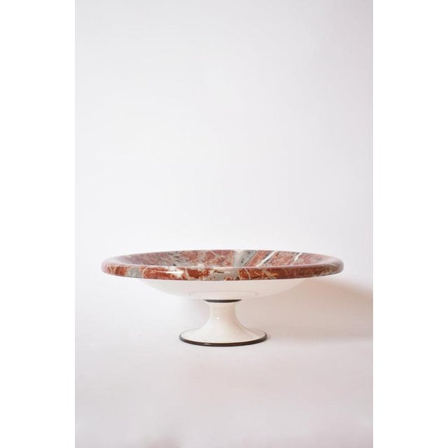 Neoclassical faux marble plate on pedestal, 1960s. Centerpiece plate on a pedestal in glazed ceramic imitating marble....