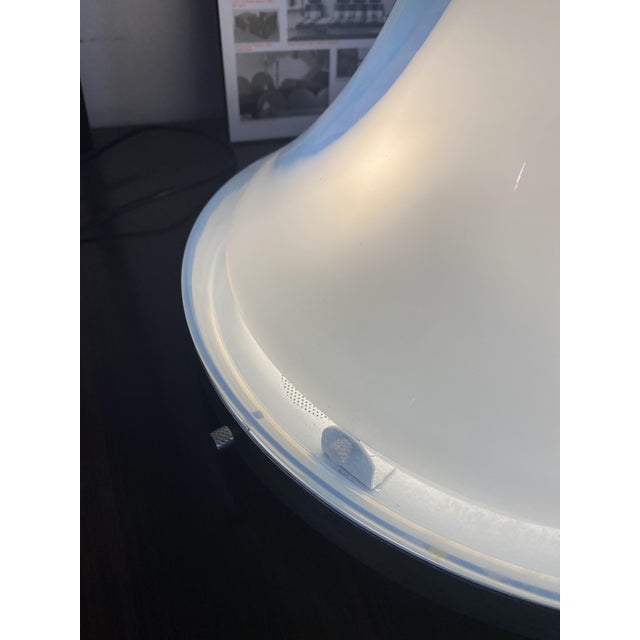 A rare, cataloged lamp. Model ls 144, made of blown murano glass. 30 cm in diameter by 40 cm in height. the ls 144 appears...