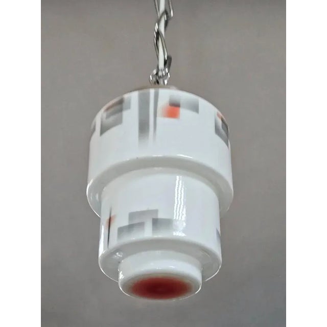 In this listing you will find a beautiful, small Stepped Skyscraper Art Deco pendant light. The glass shade is done in...