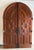 Rustic European A Pair of Arched Paneled Church Doors For Sale - Image 3 of 12