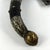 A finely crafted ceremonial blade from the Bamun people, combining elements of both knife and axe. The form is enhanced...