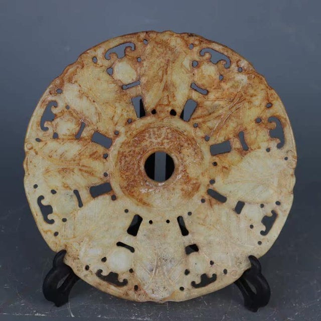 Thickness-0.6cm,Diameter-20cm. Discover the intricate craftsmanship of this Chinese Jade Plate. Hand-carved with a...