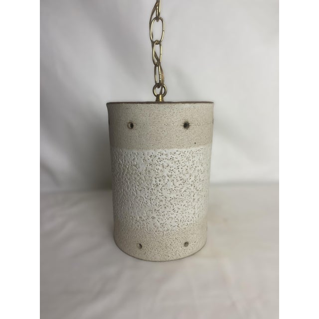 These handmade artisanal pendant lights, by Flynn Sochon, offer a unique stylistic choice for overhead indoor lighting....