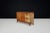 This mid-century sideboard, made from patinated French oak, was designed by René Gabriel in the 1940s in France. It was...