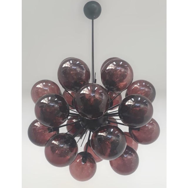 Italian sputnik chandelier with 24 amethyst Murano glass globes carefully hand blown with bubbles inside the glass using...