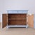 A charming antique pine cupboard with beautiful pale blue paint and plenty of character throughout. The painted finish...