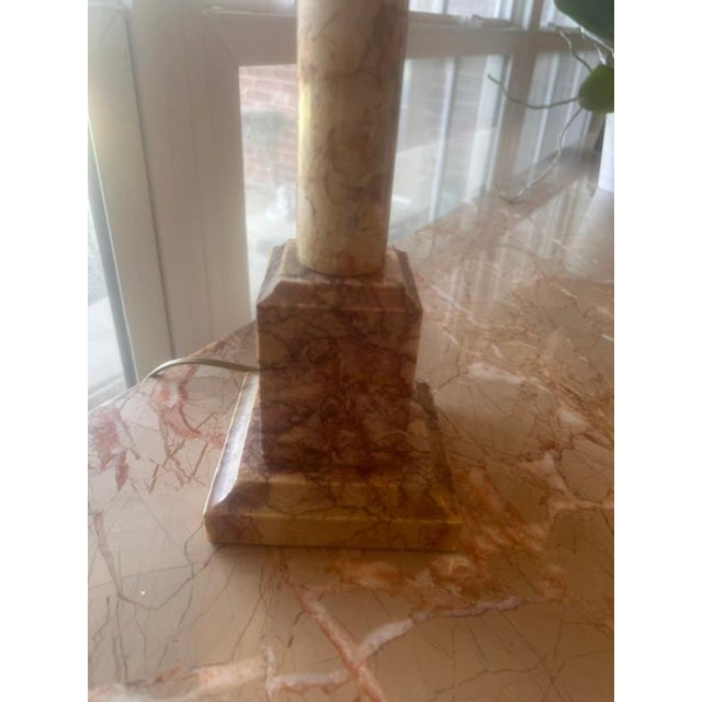 This vintage table lamp features a solid, naturally patterned stone base of onyx characteristic of mid-century Italian...
