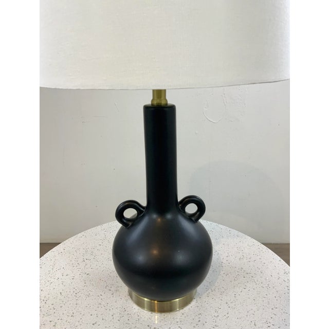 Stylish Modern Matte Black Amphora Style Table Lamp, gold base, white fabric shade, showroom floor sample
