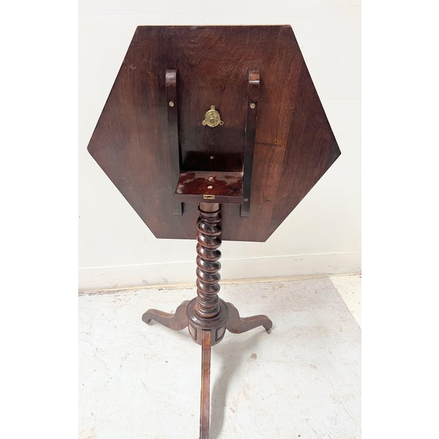 Napoleon iii-style tilting pedestal table in oak tripod base with twisted central column six-sided top inlaid with brass...