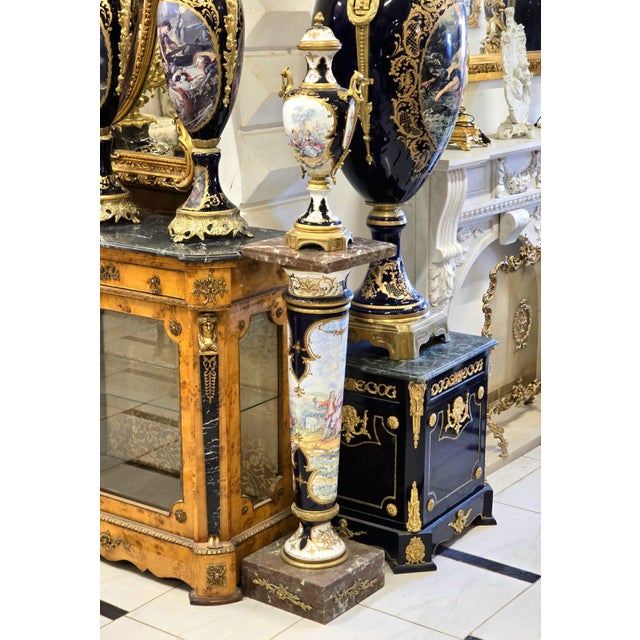 Bring the grandeur of European palaces into your home with this magnificent French Sèvres-inspired vase and pedestal set,...