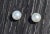 14K Yellow Gold Pearl Stud Earrings. Two classic white 5.5mm pearls make these the perfect set of studs to wear casually...