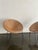 Pair of vintage French lounge chairs. Woven rattan seats with iron frames that have developed a beautiful natural patina...