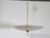 Three-light ceiling lamp with a pink textured glass shade, 1950s. Large round glass shade with a textured surface and a...