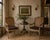 Elegant pair of vintage Hollywood Regency accent armchairs inspired by classic French Louis XV design. Each chair features...