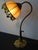 Le Dauphin table lamp, Vallères model from 1976. Bronze base with floral motifs, height-adjustable, swan-neck shaped stem....