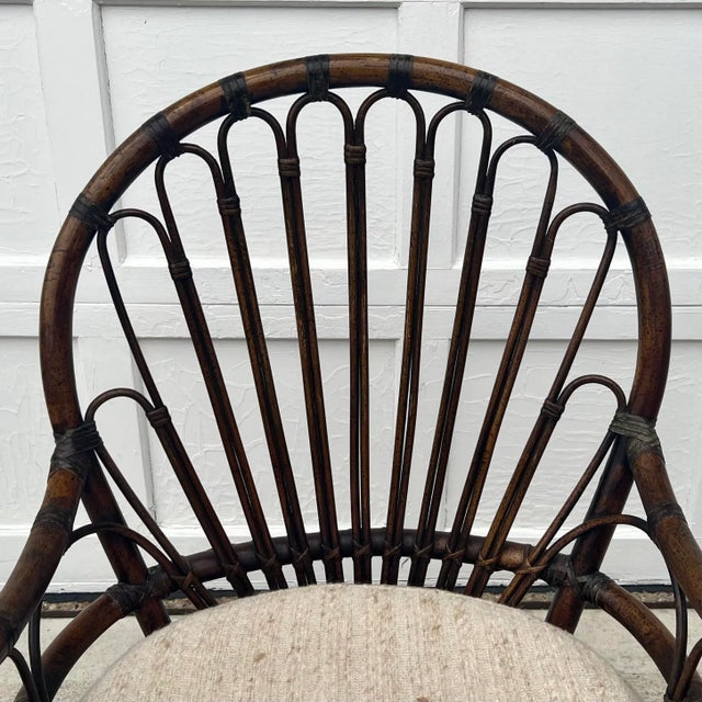 Franco Albini Style Bamboo Rattan Armchair Handcrafted steam-bent frames wrapped with leather rattan. Airy handwoven backs...