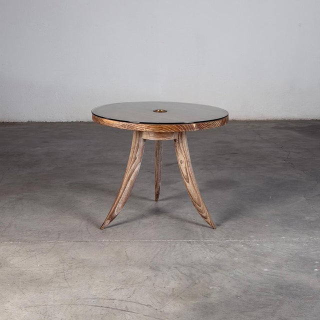 Elegant French side table from the 1940s, crafted in solid oak with a softly bleached finish and retaining its original...