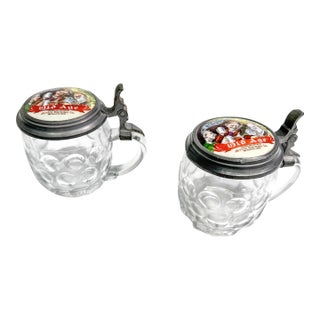 Antique Pre-Prohibition Jetter Brewing Co Old Age Glass Lidded Beer Steins, South Omaha Nebraska Brewery Advertising c.1902–1914 - Set of 2 For Sale