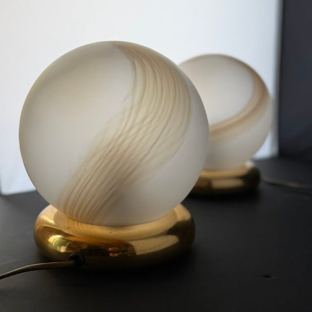 Pair of Sculptural Table Lamps with Glass Globes Europe | Mid- to Late 20th Century Elegant pair of table lamps featuring...