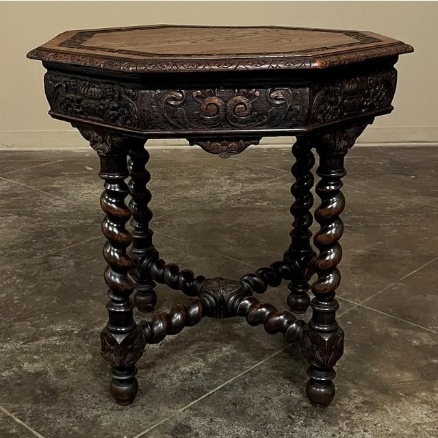 Antique French Renaissance Octagonal Barley Twist End Table was fashioned from solid oak and features a gadrooned and...