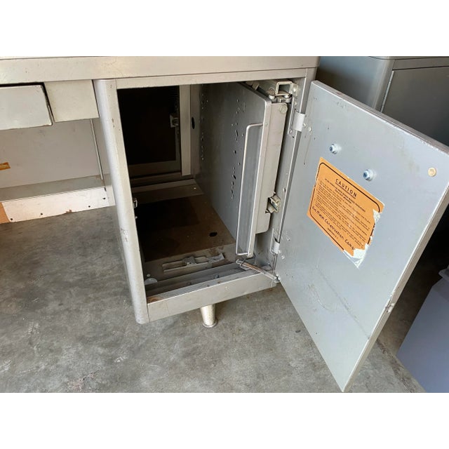 Vintage mid century modern metal tanker desk with typewriter shelf , from Wells Fargo bank in San Francisco has some marks...