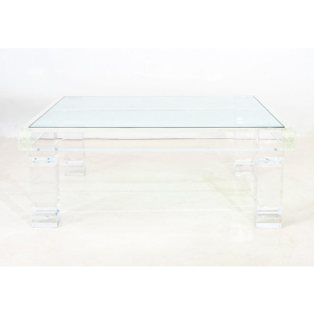 Merritt-Emanuel Ltd. Glass Top and Beveled Clear Acrylic Coffee Table. 16.5" H x 42" W x 42" D. Provenance: From a 422...