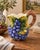 Beautiful vintage hand-painted ceramic pitcher made in Bassano, Italy. Features a raised grapevine design with clusters of...