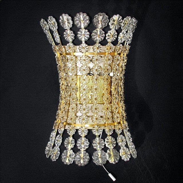 Original mid-century wall light sconce crystal lamp, on a brass base, designed by the famous austrian designer emil...