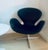 Vintage black vinyl Swan swivel lounge chair, Fritz Hansen 1970s. Vintage condition, the vinyl upholstery has been patched...