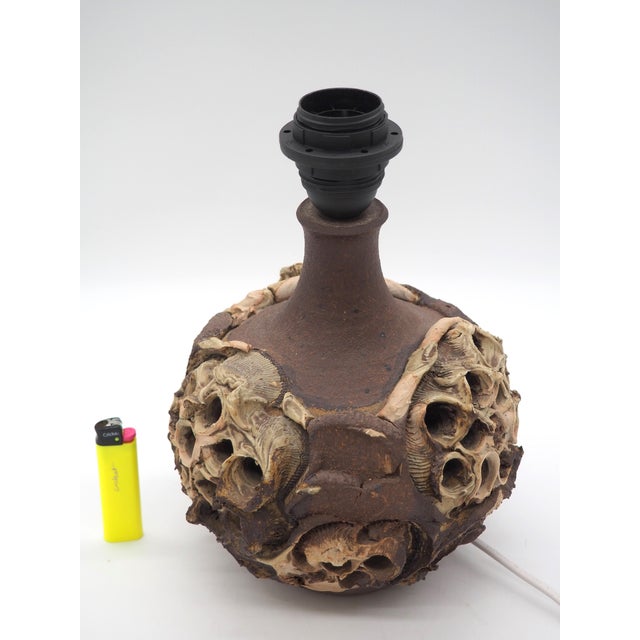 A unique, handmade ceramic lamp by the Danish studio potter Bodil Marie Nielsen, known for her organic, nature-inspired,...