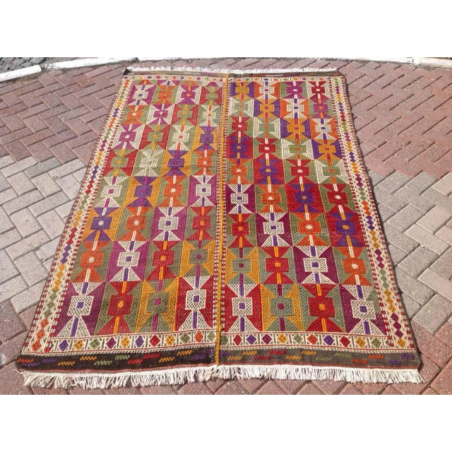 This beautiful, vintage, handwoven embroidered kilim is approximately 60 years old. It is handmade of very fine quality...