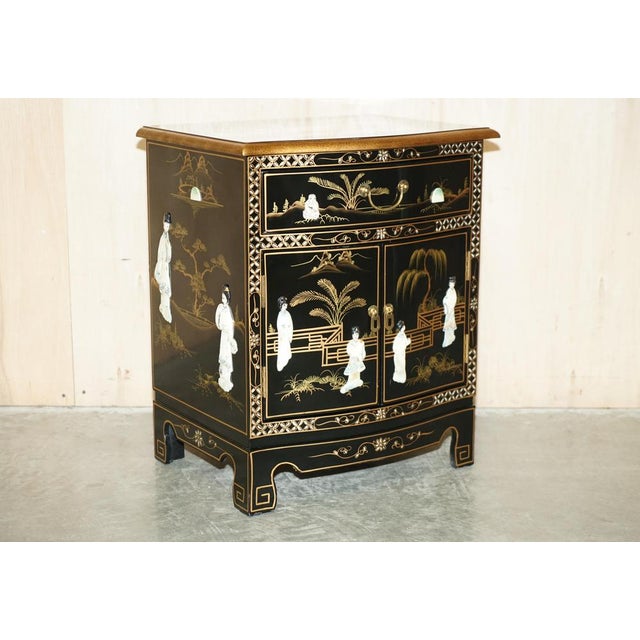 We are delighted to offer for sale this lovely Chinese side cabinet with native scenes of Geisha girls carved out of...