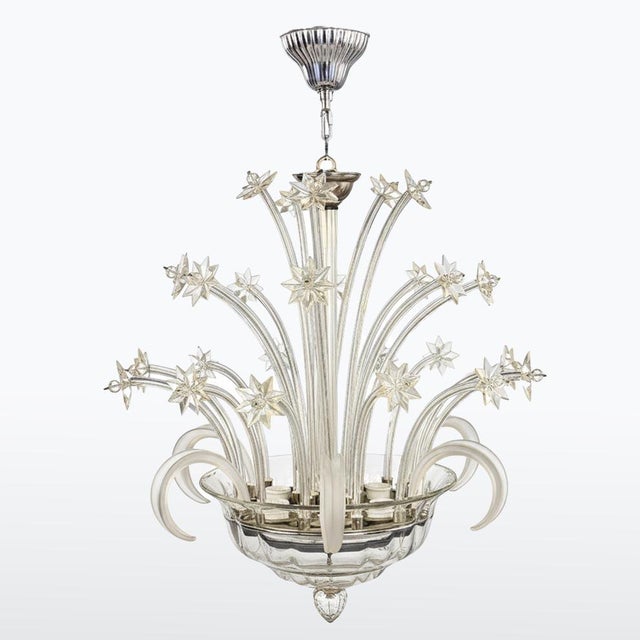 n impressive glass chandelier from the first half of the 20th century, featuring a richly decorative design inspired by...