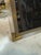Elegant Italian Mid-Century Modern picture frame crafted in brushed brass with fluted clear Lucite accents and rounded...