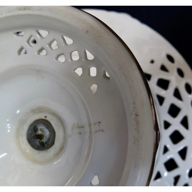 This vintage pair of French porcelain compote servers dates from the 19th century. Each is beautifully designed with a...