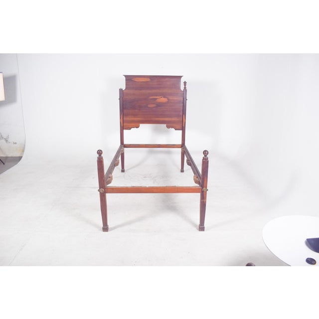 This refined double bed is a beautiful example of Portuguese 19th-century furniture in the D. Maria style. Made from solid...