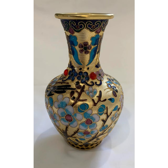 Vintage Enameled Metal Bud Vase with gold and blue paint and carved wood base (possibly rosewood)