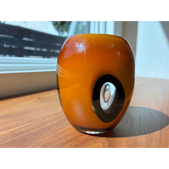A striking pair of vintage Dreamlight Mediterrana art-glass objects handcrafted in Germany, featuring warm amber, ivory,...