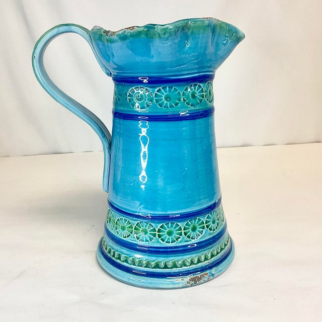 This is a gorgeous terra cotta pottery from Italy. It’s in the style of Bitsossi and features a turquoise glaze. It’s has...