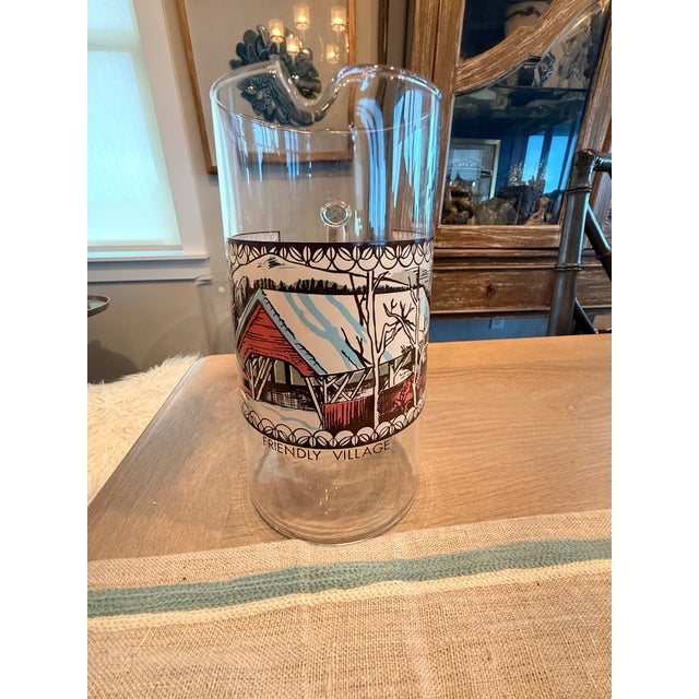 Vintage glass pitcher by Johnson Brothers. The pitcher is from the Friendly Village collection.