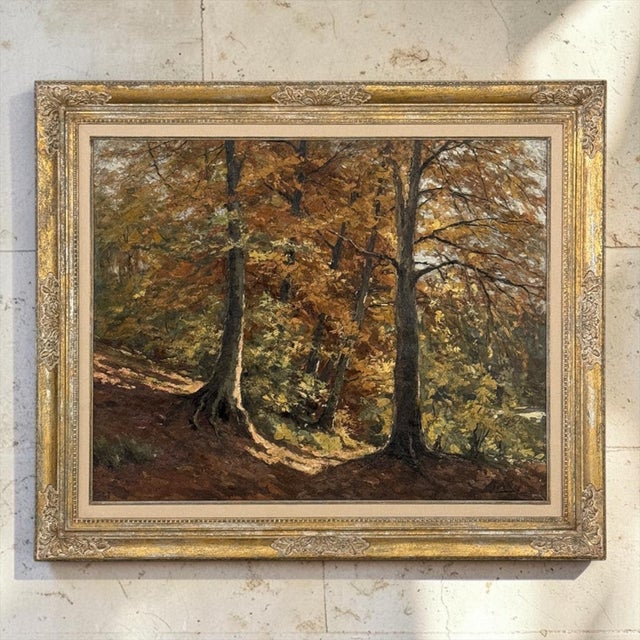 Fernand Ley’s “Trail in the Forest” is a signed and dated 1942 French oil painting on canvas capturing the quiet radiance...