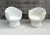 Mid-Century natural wicker pod chairs have great lines and could be used indoors or in a protected outdoor space. The...