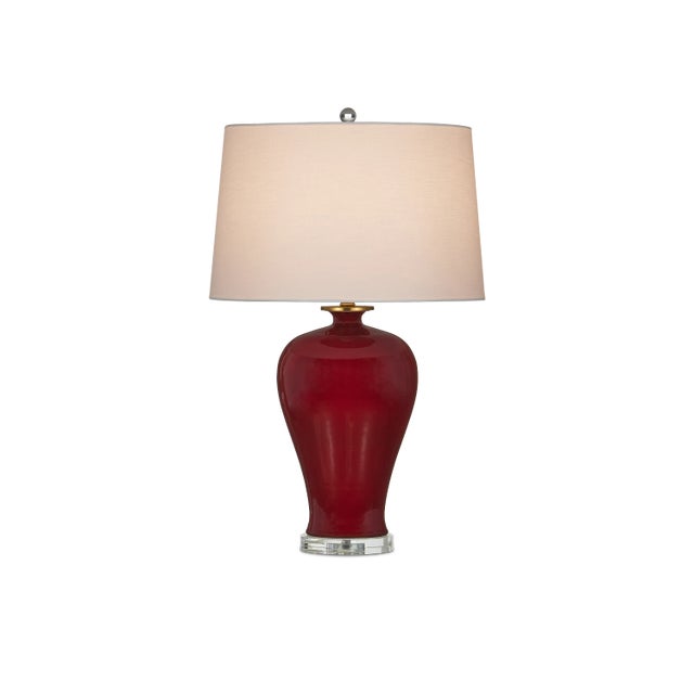 Culturally, the color of the Imperial Red Table Lamp is significant, as it is created by a small family factory in China;...