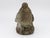 Mid-20th Century concrete garden ornament in the shape of a dove. The dove is perched on a rock with lovely detail on the...