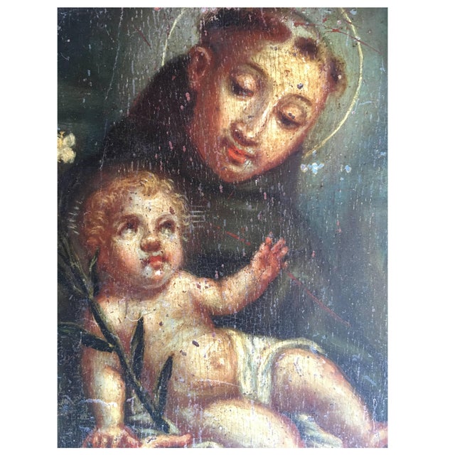 Original oil on panel of Saint offering the Child, by an unidentified artist. --This painting represents St. Anthony of...