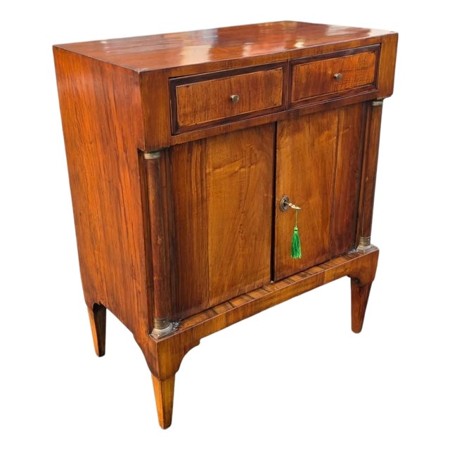 American Classical Figured Flame Mahogany Two-Drawer Cabinet With Brass-Mounted Columns, Circa 1840 For Sale