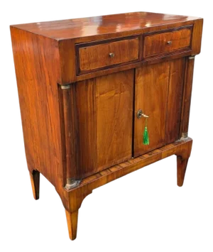 American Classical Figured Flame Mahogany Two-Drawer Cabinet With Brass-Mounted Columns, Circa 1840