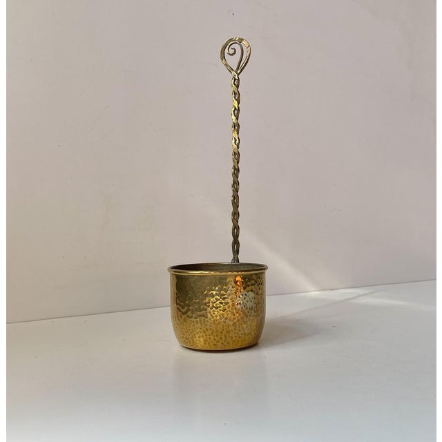 A stylish and elegantly executed wall hung planter or bowl. Fashioned from hammered, cut and partially hand-shaped twisted...